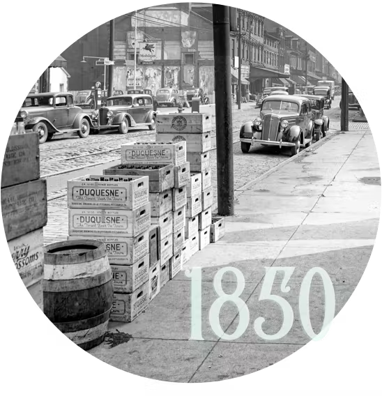 strip district sidewalks with wooden boxes and barrels, and the text '1850'