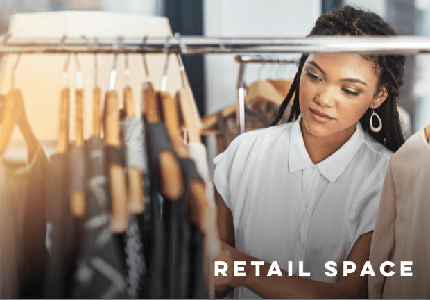 a woman looking through a rack of clothes, with text reading Retail Space